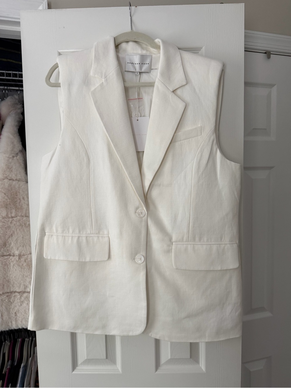 Sleeveless White Blazer Vest